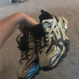 Khaki and black Balenciaga tracks.